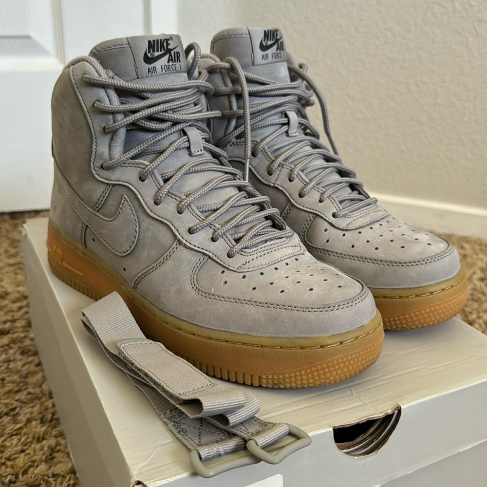 Air Force 1 High WB in Grey suede finish with Black. Size 6Y, Size 8 in womens.